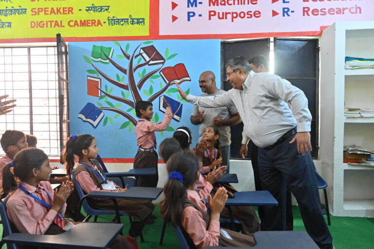 Kaizad with school kids