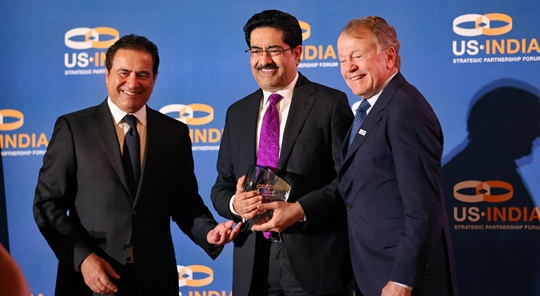 Kumar Mangalam Birla, Recepient of the USISPF Global Leadership Award, flanked by Mukesh Aghi to the left and John Chambers to the Right