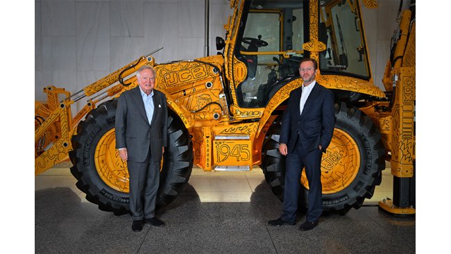 Lord Bamford and his son George Bamford